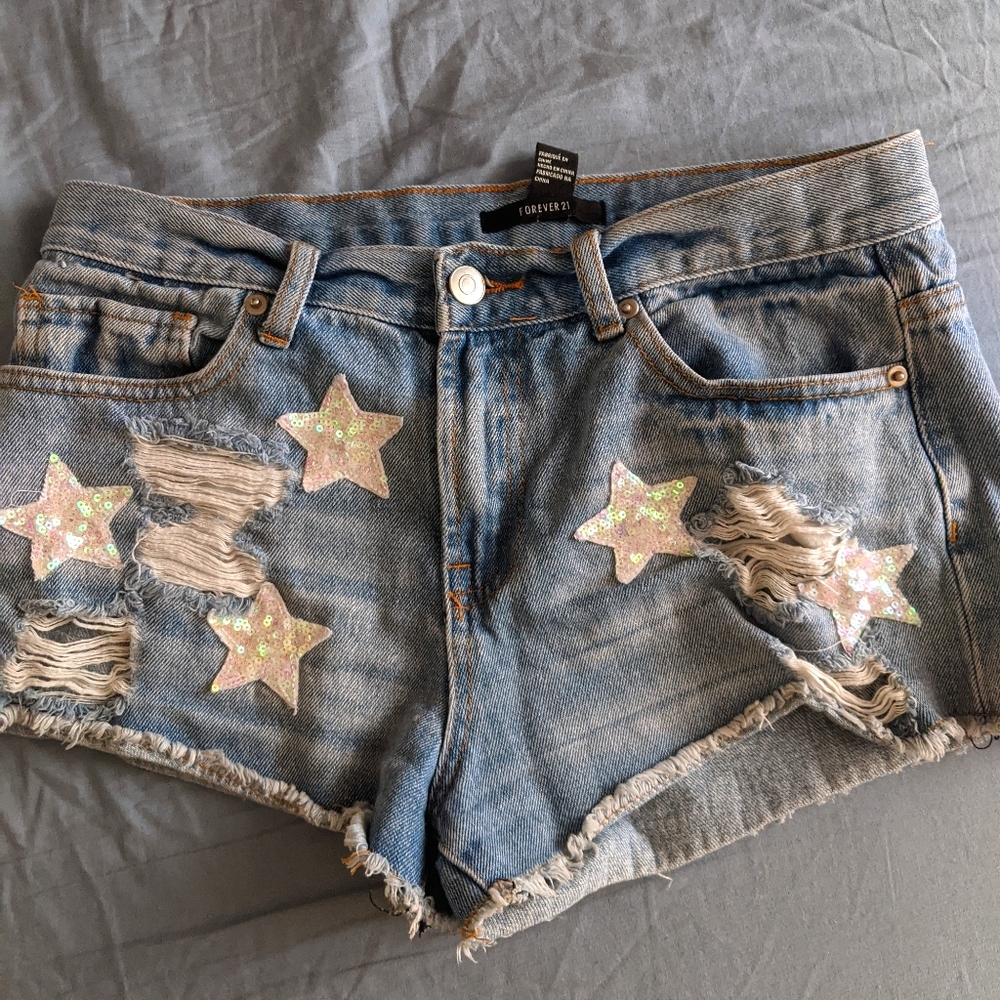 Star sequin distressed denim shorts